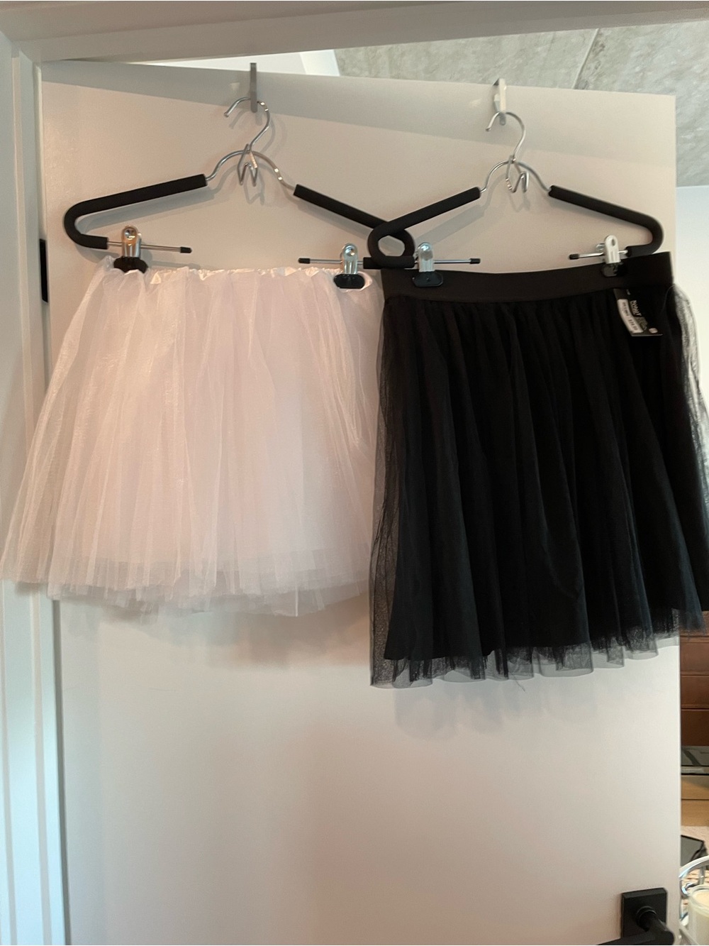 SPIRIT HALLOWEEN TULLE SKIRTS. SHEER TIERD FANRIC. ELASTIC WAIST FOR COMFORT.